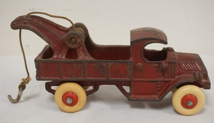 ANTIQUE CAST IRON TOY: ANTIQUE CAST IRON TOY *CHAMPION*TOW TRUCK, APPROXIMATELY 7 IN X 3 1/4 IN H