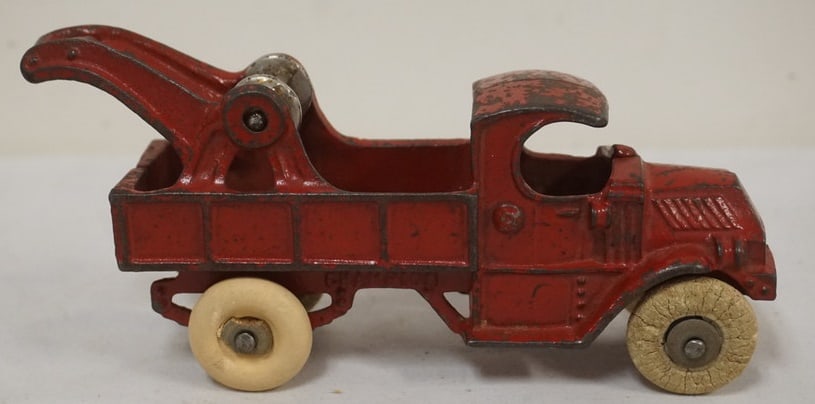 ANTIQUE CAST IRON TOY: ANTIQUE CAST IRON TOY *CHAMPION*TOW TRUCK, APPROXIMATELY 7 IN X 3 1/4 IN H