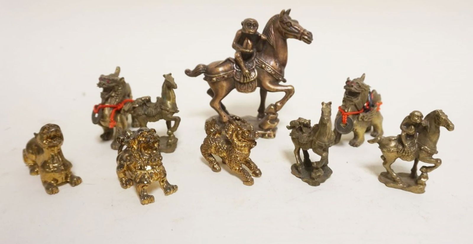 GROUP OF ASSORTED SOLID BRASS ASIAN ITEMS: GROUP OF ASSORTED SOLID BRASS ASIAN ITEMS, LARGEST APPROXIMATELY 4 IN HIGH