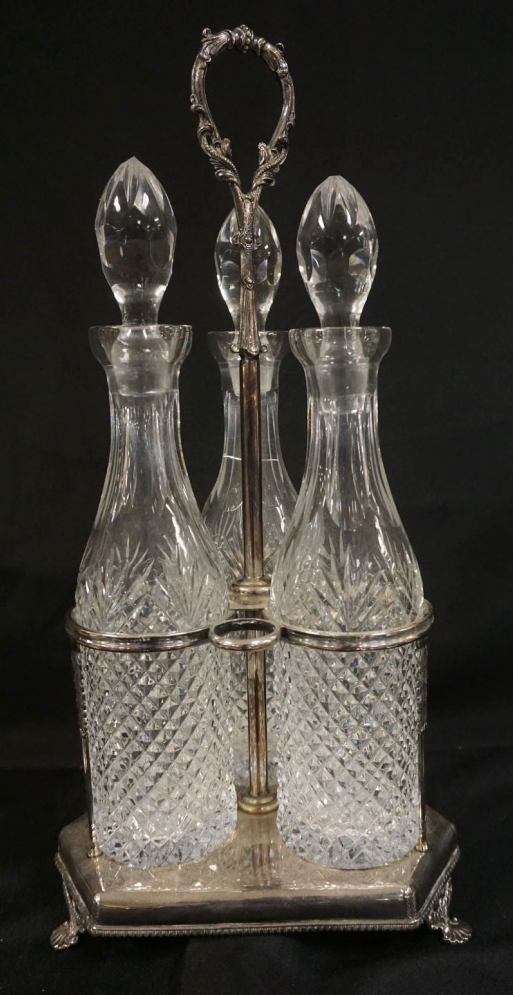 VICTORIAN 3 BOTTLE FOOTED TANTALUS (1 of 4)