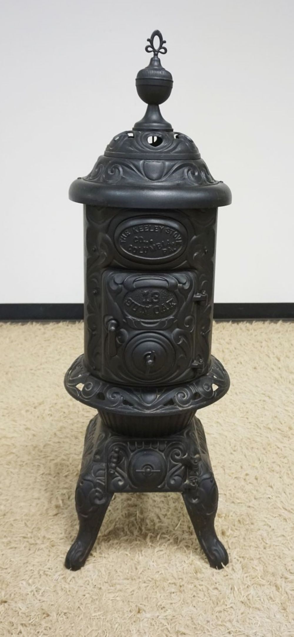 CAST IRON POT BELLY STOVE (1 of 3)
