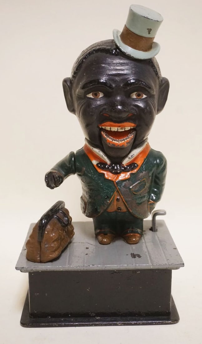 ANTIQUE CAST IRON MECHANICAL BANK: ANTIQUE CAST IRON MECHANICAL BANK *STUMP SPEAKER* APPROXIMATELY 4 IN X 5 IN X 9 3/4 IN H