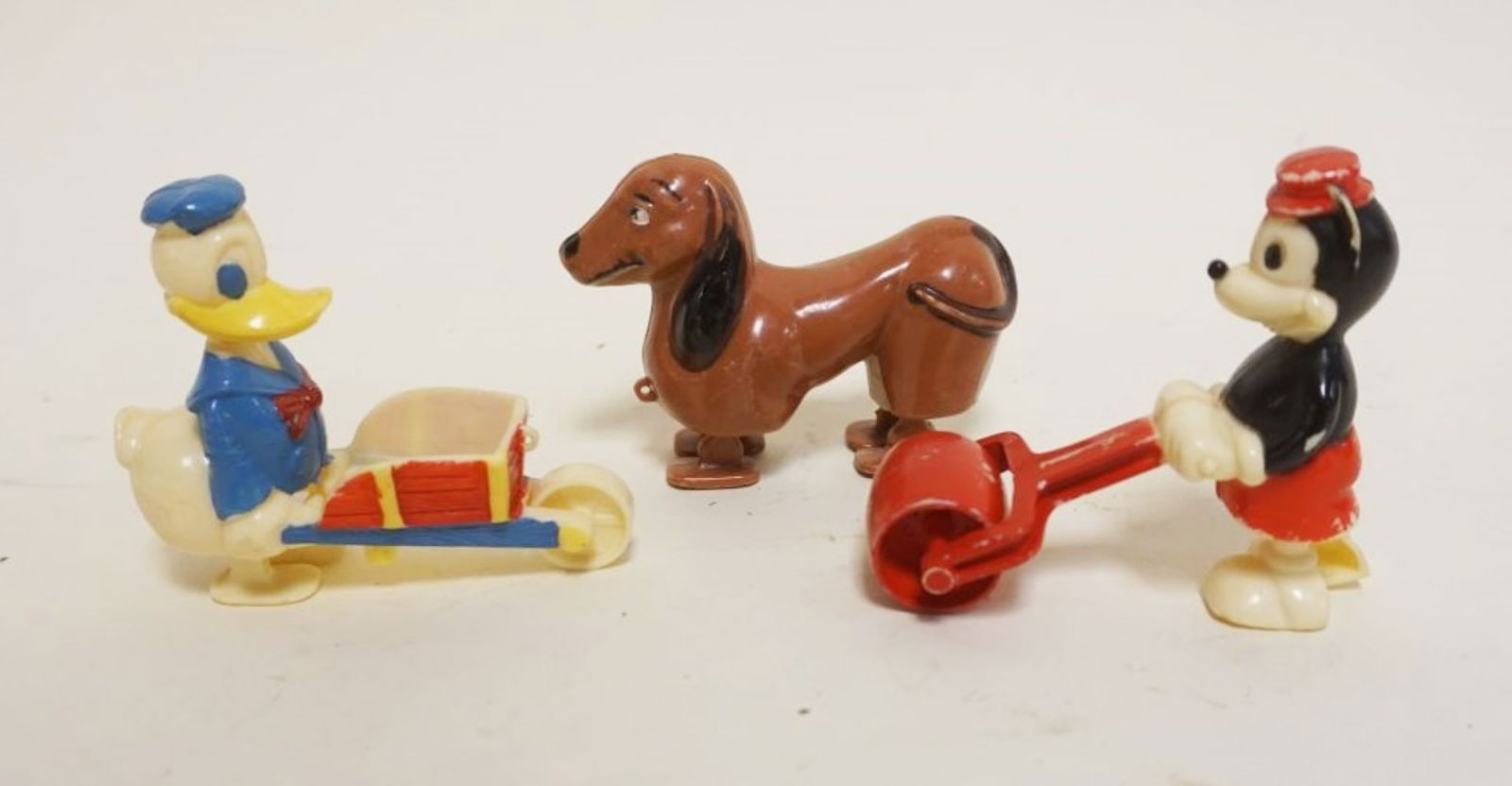 3 PIECE VINTAGE DISNEY PLASTIC PUSH TOYS (1 of 3)