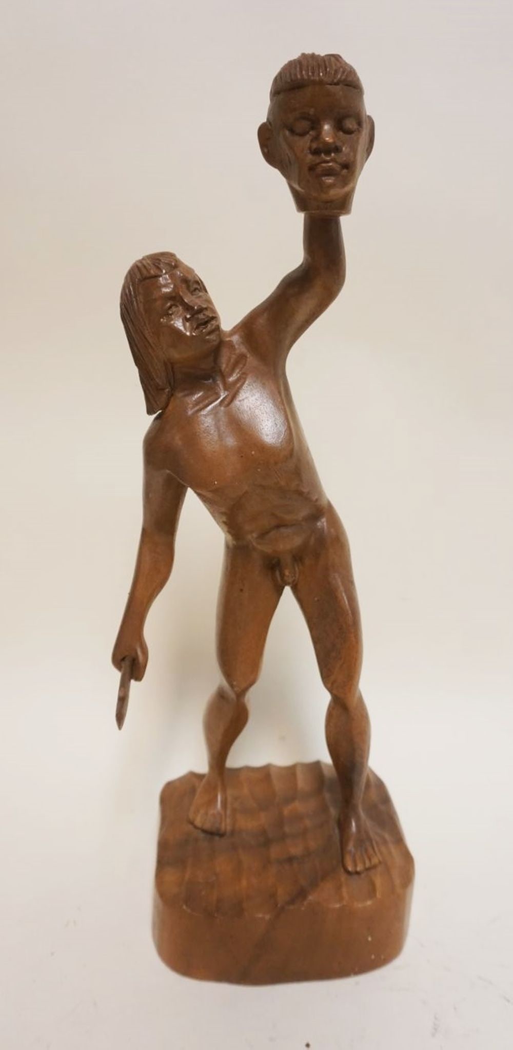 ETHNIC WOOD CARVING OF HEAD HUNTER (1 of 3)