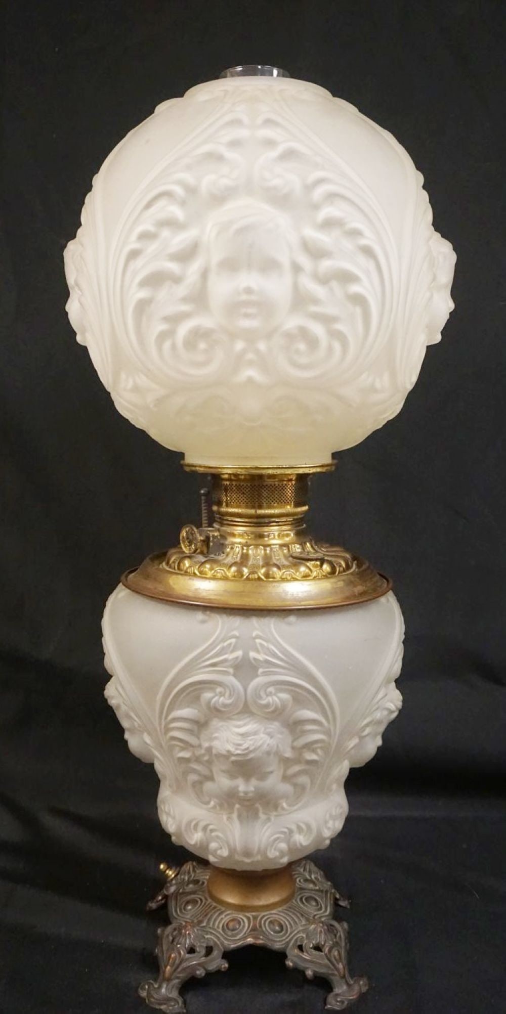 SATIN GLASS CHERUB FACED GWTW LAMP: SATIN GLASS CHERUB FACED GONE WITH THE WIND LAMP, ELECTRIFIED, APPROXIMATELY 25 IN HIGH