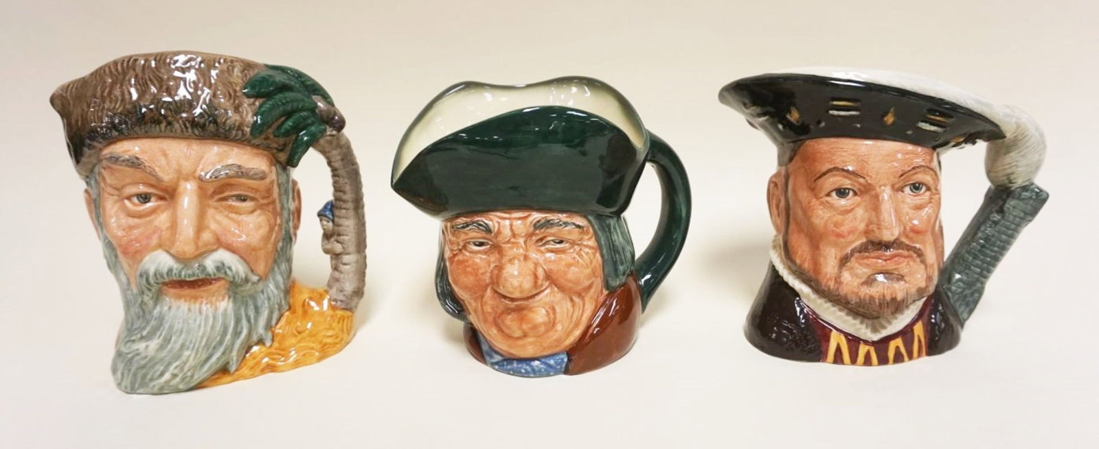 3 ROYAL DOULTON TOBIES: 3 ROYAL DOULTON TOBIES, ROBINSON CRUSOE, HENRY VIII, TOBY PHILPOTS, TALLEST APPROXIMATELY 8 IN