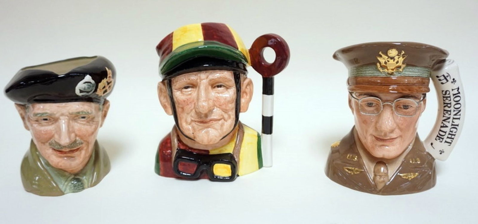 3 ROYAL DOULTON TOBIES: 3 ROYAL DOULTON TOBIES, MONTY, JOCKEY, GLENN MILLER, TALLEST APPROXIMATELY 8 1/2 IN