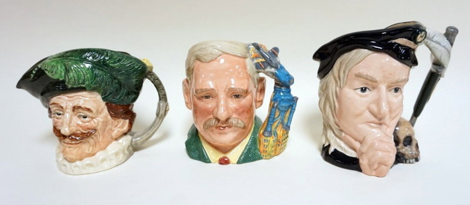 3 ROYAL DOULTON TOBIES: 3 ROYAL DOULTON TOBIES, HAMLET, HG WELLS, THE CAVALIER, TALLEST APPROXIMATELY 8 IN