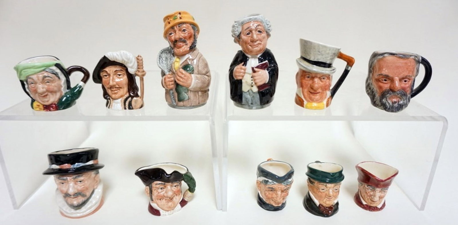 ROYAL DOULTON TOBIES: ROYAL DOULTON TOBIES, GROUP OF 11, TALLEST APPROXIMATELY 4 IN