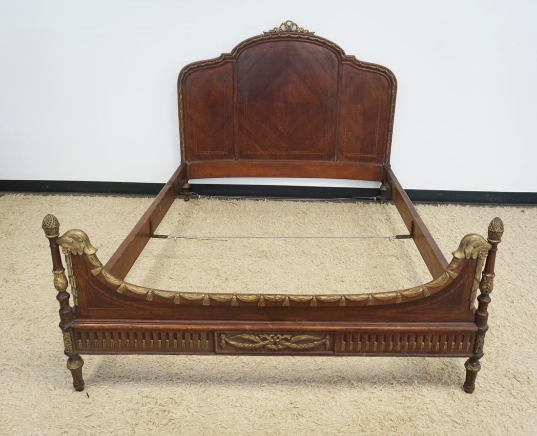 FRENCH MAHOGANY ORNATE BED: FRENCH MAHOGANY ORNATE BED WITH GILT WOOD ACCENTS AND DIAMOND BOOOK MATCHED VENEER WITH BANDED TRIM, APPROXIMATELY 48 IN X 80 IN X 57 IN OUTSIDE DIAMETER, 54 IN INSIDE DIAMETER