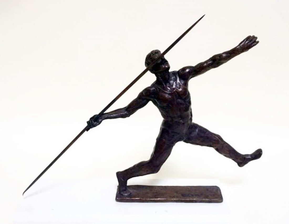 CAST BRONZE IMAGE OF MAN: CAST BRONZE IMAGE OF MAN THROWING JAVELIN, APPROXIMATELY 2 IN X 18 IN X 10 IN HIGH, SIGNED KELSEY ON BASE