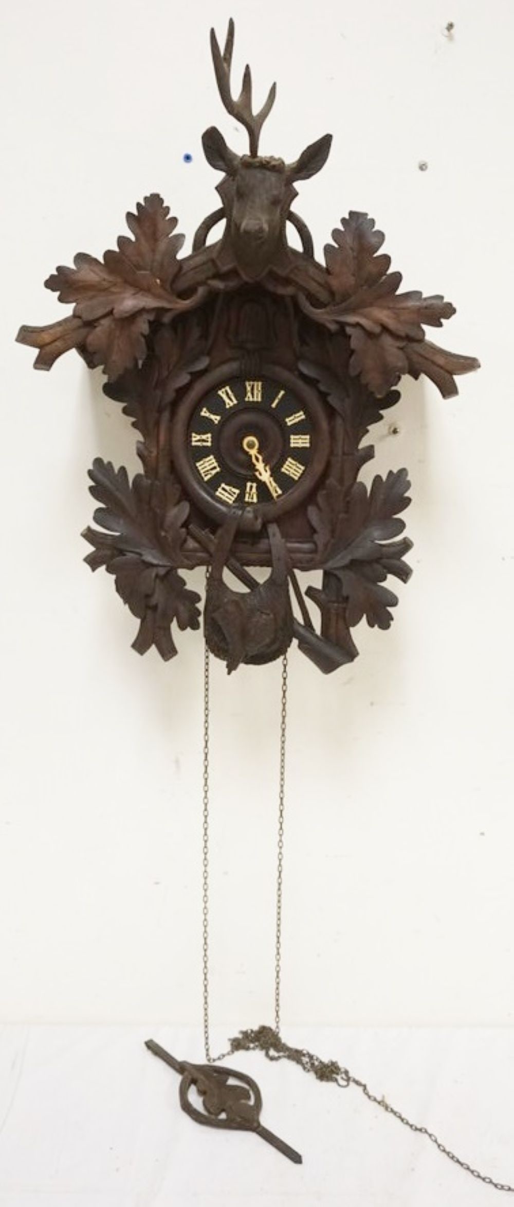 CARVED CUCKOO CLOCK: CARVED CUCKOO CLOCK, SOME LOSS TO CARVING, SOLD AS FOUND FOR RESTORATION, APPROXIMATELY 18 IN X 12 IN X 26 IN HIGH