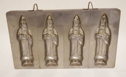 ANTIQUE CHOCOLATE SANTA CLAUS MOLD: ANTIQUE CHOCOLATE SANTA CLAUS MOLD, APPROXIMATELY 6 IN X 11 IN
