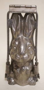 ANTIQUE CHOCOLATE RABBIT MOLD: ANTIQUE CHOCOLATE RABBIT MOLD, APPROXIMATELY 3 IN X 7 IN