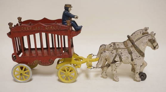 VINTAGE CAST IRON *OVERLAND CIRUS* WAGON: VINTAGE CAST IRON HORSE DRAWN *OVERLAND CIRUS* WAGON, APPROXIMATELY 15 IN X 4 IN X 8 IN HIGH