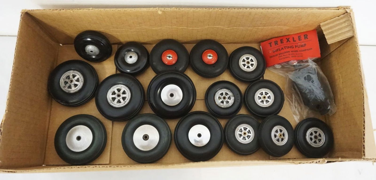 VINTAGE MODEL AIRPLANE TIRES & INFLATING PUMP (1 of 1)