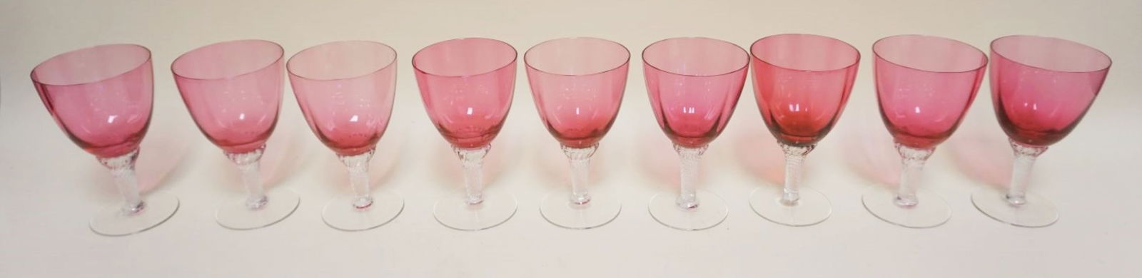 9 CRANBERRY TO CLEAR GOBLETS: 9 CRANBERRY TO CLEAR GOBLETS, APPROXIMATELY 6 1/4 IN HIGH