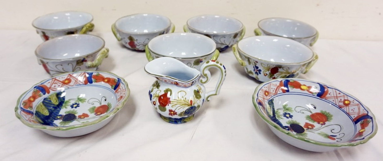 ITALIAN FAIENCE BOWLS, ETC.: ITALIAN FAIENCE 7 - 6 IN BOWLS, 2 - 61/2 IN BOWLS AND CREAMER