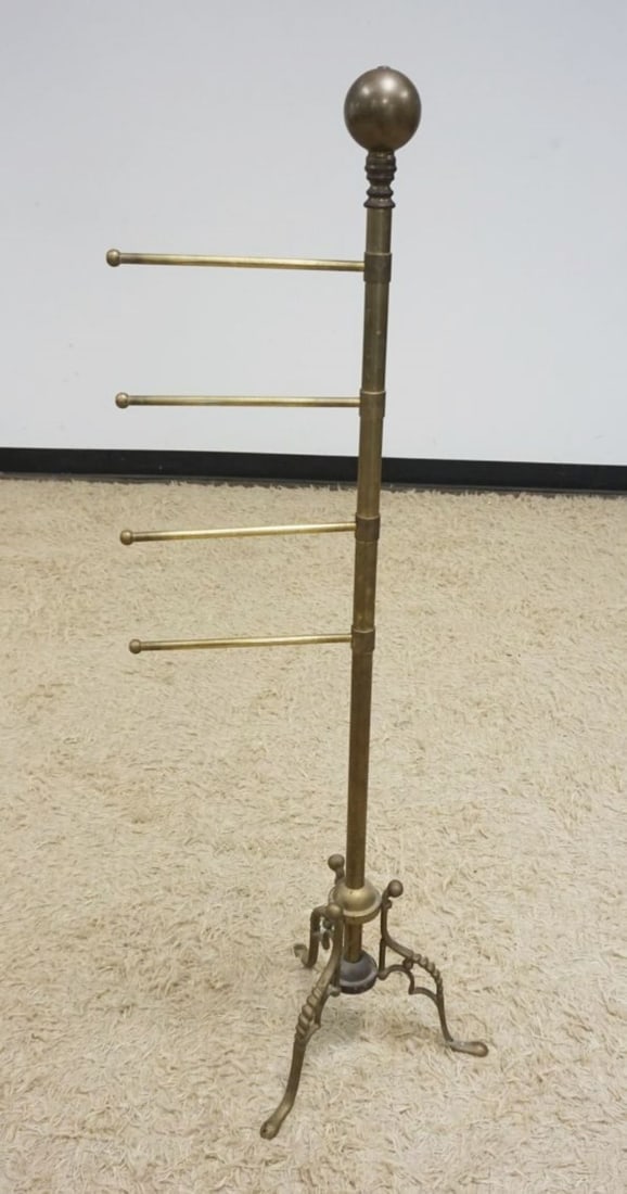 BRASS SNAKE FOOT TOWEL BAR: BRASS SNAKE FOOT TOWEL BAR WITH PIVOTING RODS, APPROXIMATELY 50 IN H