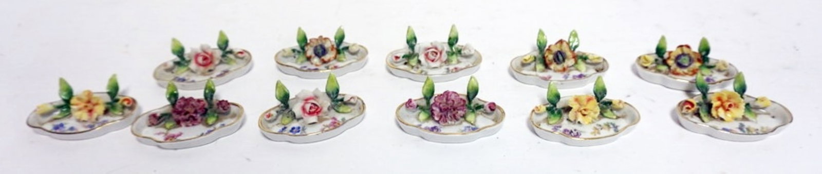 ANTIQUE PORCELAIN FLORAL PLACE CARD HOLDERS: ANTIQUE PORCELAIN FLORAL PLACE CARD HOLDERS, SET OF 11, EACH APPROXIMATELY 3 IN X 2 IN X 1 IN H