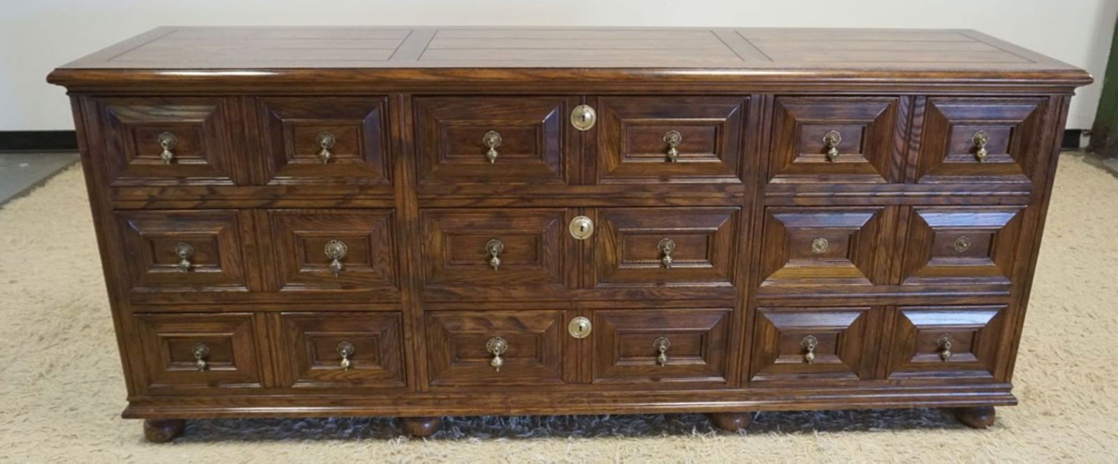 HENREDON OAK CHEST: HENREDON OAK 9 DRAWER CHEST, APPROXIMATELY 78 IN X 20 IN X 33 IN H, 2 DRAWERS LOSS TO PULLS