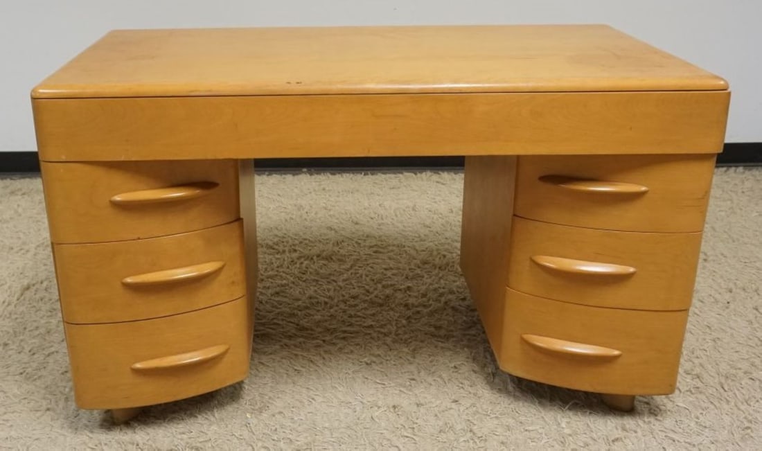 HAYWOOD WAKEFIELD MID CENTURY DESK: HAYWOOD WAKEFIELD MID CENTURY DESK HAVING 7 DRAWERS, TOP DRAWER NEEDS ATTENTION, DRAWER FRONT NEEDS TO BE REATTACHED, 1 SIDE AND DRAWER HAS SWELLING, APPROXIMATELY 50 IN X 24 IN X 30 IN HIGH