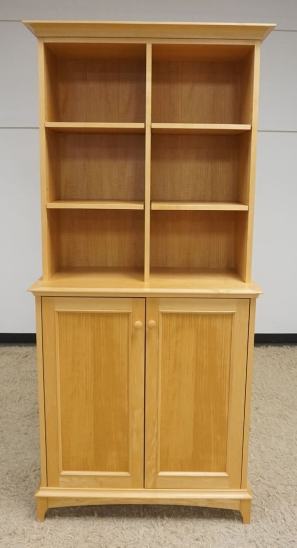 CUSTOM BENCH MADE MAPLE CUPBOARD: CUSTOM BENCH MADE NARROW SOLID MAPLE CUPBOARD WITH ADJUSTABLE SHELVES OVER 2 DOORS, APPROXIMATELY 36 IN X 19 IN X 80 IN H, MADE BY FURNITURE BY DESIGN, PA