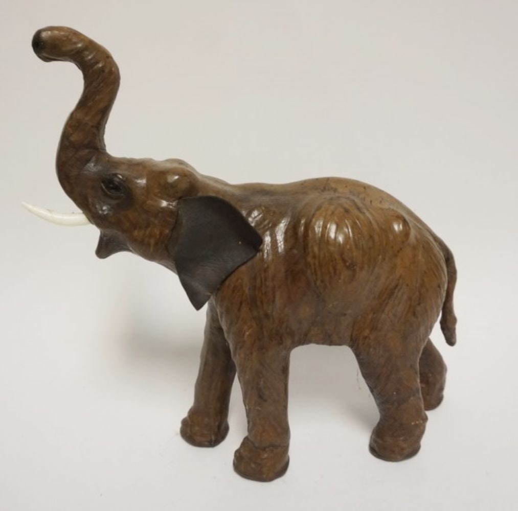 LEATHER ELEPHANT: LEATHER ELEPHANT MISSING ONE TUSK, APPROXIMATELY 14 IN X 6 IN X 14 IN HIGH