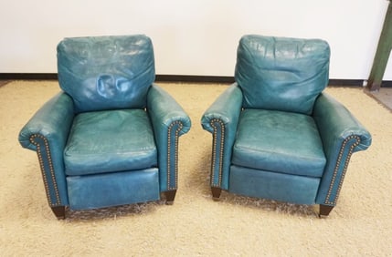 PAIR OF TUQUOISE LEATHER RECLINERS