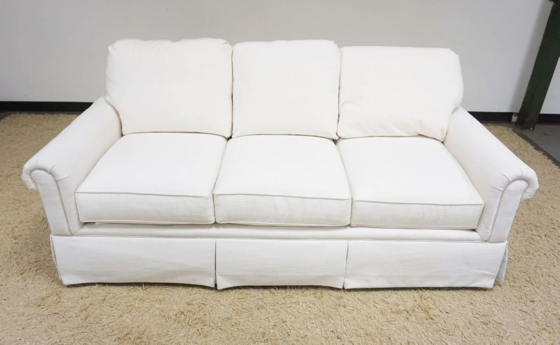 BASSET IVORY UPHOLSTERED SOFA: BASSET IVORY UPHOLSTERED SOFA, APPROXIMATELY 80 IN X 38 IN X 30 IN HIGH