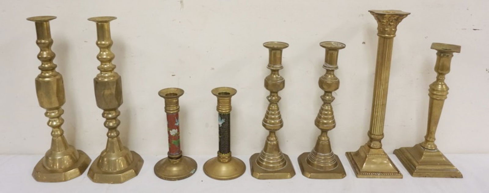 COLLECTION OF 20TH CENTURY BRASS CANDLESTICKS: COLLECTION OF 20TH CENTURY BRASS CANDLESTICKS, LARGEST APPROXIMATELY 12 IN H