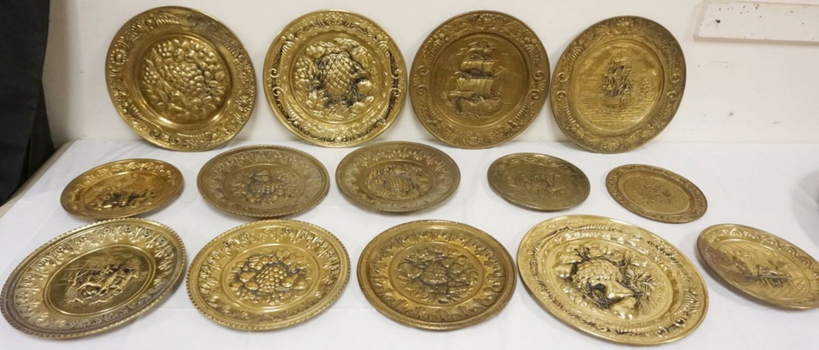 LARGE GROUP OF ASSORTED BRASS WALL CHARGERS (1 of 3)