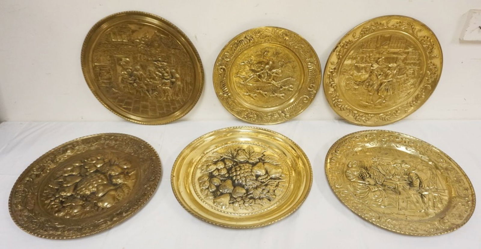 LARGE GROUP OF ASSORTED BRASS WALL CHARGERS (1 of 3)