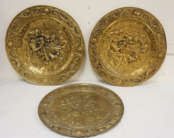 GROUP OF BRASS EMBOSSED CHARGERS