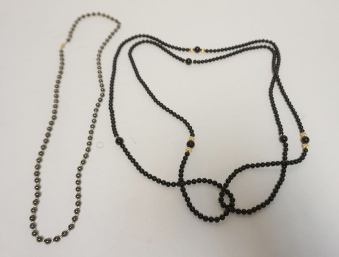 ONYX AND GOLD NECKLACES: 2 ONYX AND GOLD NECKLACES, 1 CLASP MARKED 14K