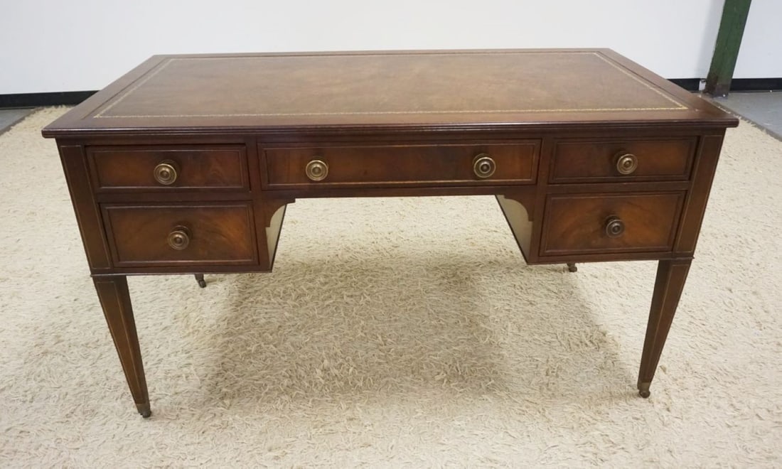 MAHOGANY LEATHER TOP DESK: MAHOGANY LEATHER TOP DESK WITH 5 DRAWERS AND PENCIL INLAID TAPERED LEGS, APPROXIMATELY 53 IN X 27 IN X 30 IN H
