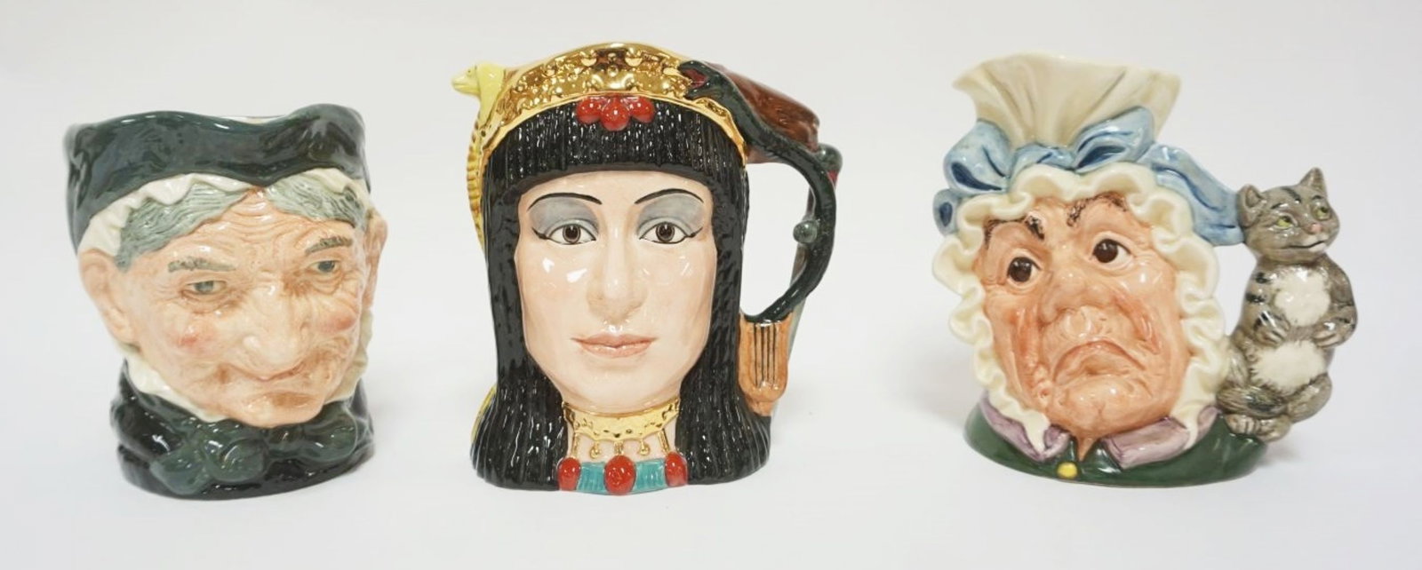 ROYAL DOULTON CHARACTER TOBY JUGS: ROYAL DOULTON CHARACTER TOBY JUGS, GRANNY, THE COOK & THE CHESHIRE CAT, STAR CROSSED LOVERS COLLECTION ANTHONY & CLEOPATRA, EACH APPROXIMATELY 8 IN HIGH