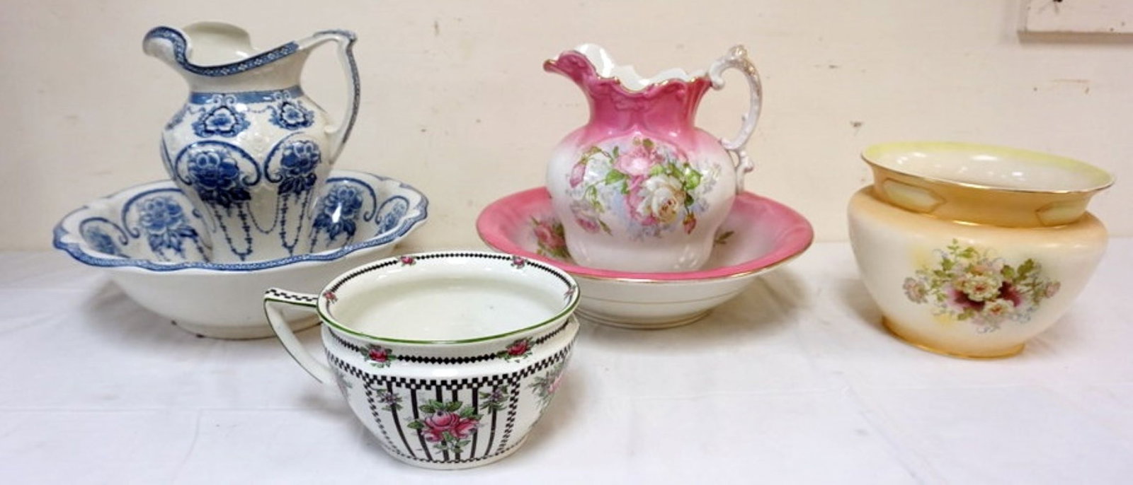 ANTIQUE WATER BOWLS AND PITCHERS, ETC: ANTIQUE WATER BOWLS AND PITCHERS, CHAMBER POT AND JARDINEER, LARGEST PIECE APPROXIMATELY 16 IN X 14 IN H