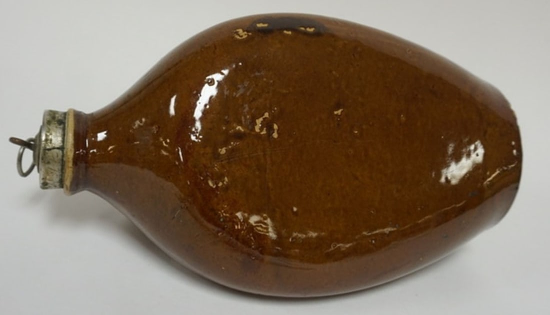 STONEWARE BROWN GLAZED FOOT WARMER: STONEWARE BROWN GLAZED FOOT WARMER, APPROXIMATELY 13 IN H