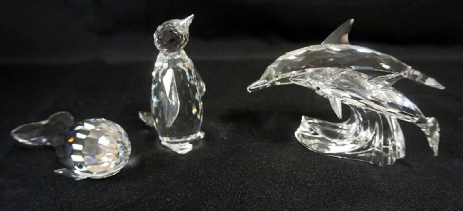 SWAROVSKI CRYSTAL FIGURES: SWAROVSKI CRYSTAL FIGURES, WHALE, PENGUIN AND DOUBLE DOULPHIN, TALLEST APPROXIMATELY 5 IN X 3 IN