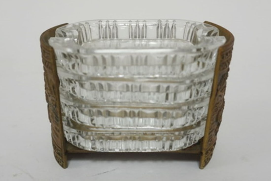 NEST OF ASH TRAYS IN ORNATE BRONZE HOLDER: NEST OF OVAL GLASS ASHTRAYS IN ORNATE BRONZE HOLDER, MARKED ITALY ON BASE, APPROXIMATELY 4 1/2 IN X 2 1/2 IN X 3 1/2 IN H
