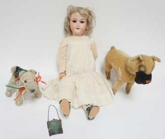 ANTIQUE A & M BISQUE DOLL AND STUFFED DOGS