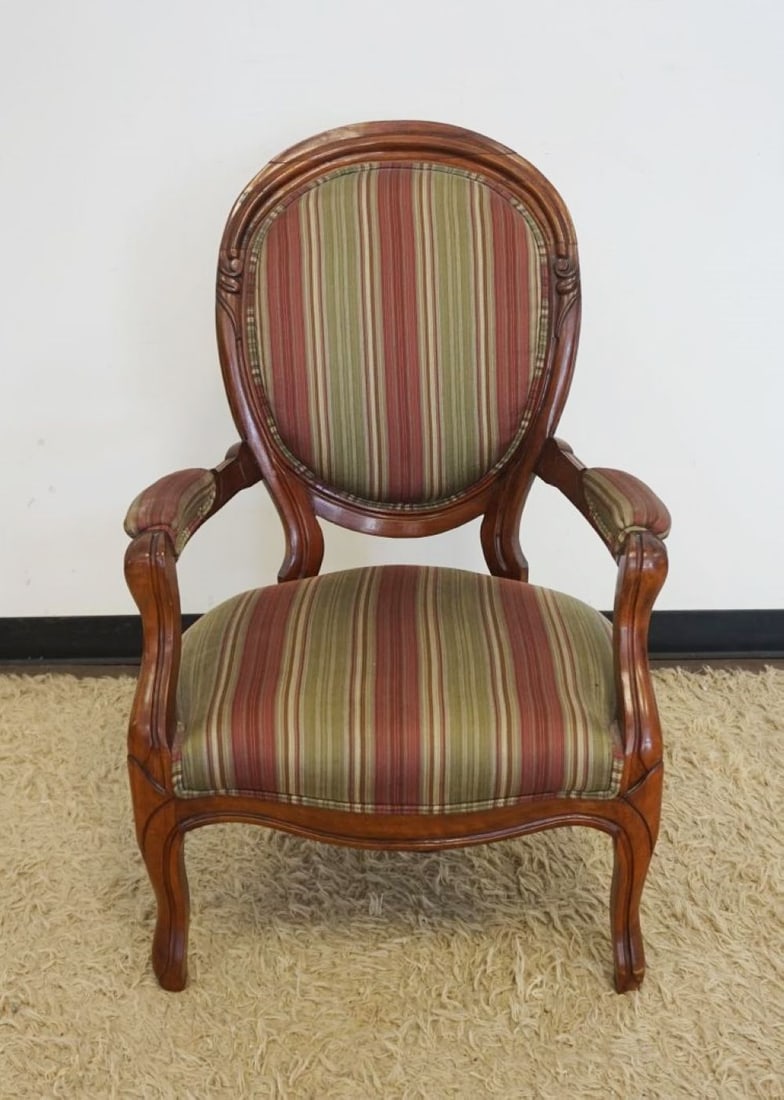 VICTORIAN WALNUT UPHOSTERED ARM CHAIR: VICTORIAN WALNUT FINGER CARVED UPHOLSTERED ARM CHAIR, APPROXIMATELY 24 IN X 22 IN X 40 IN H