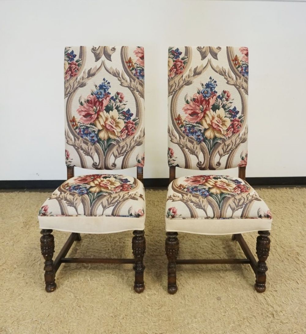 PAIR OF FLORAL HIGH BACK CHAIRS: PAIR OF FLORAL UPHOLSTERED HIGH BACK CHAIRS WITH CARVED URN SHAPED FRONT LEGS, EACH APPROXIMATELY 22 IN X 22 IN X 52 IN H