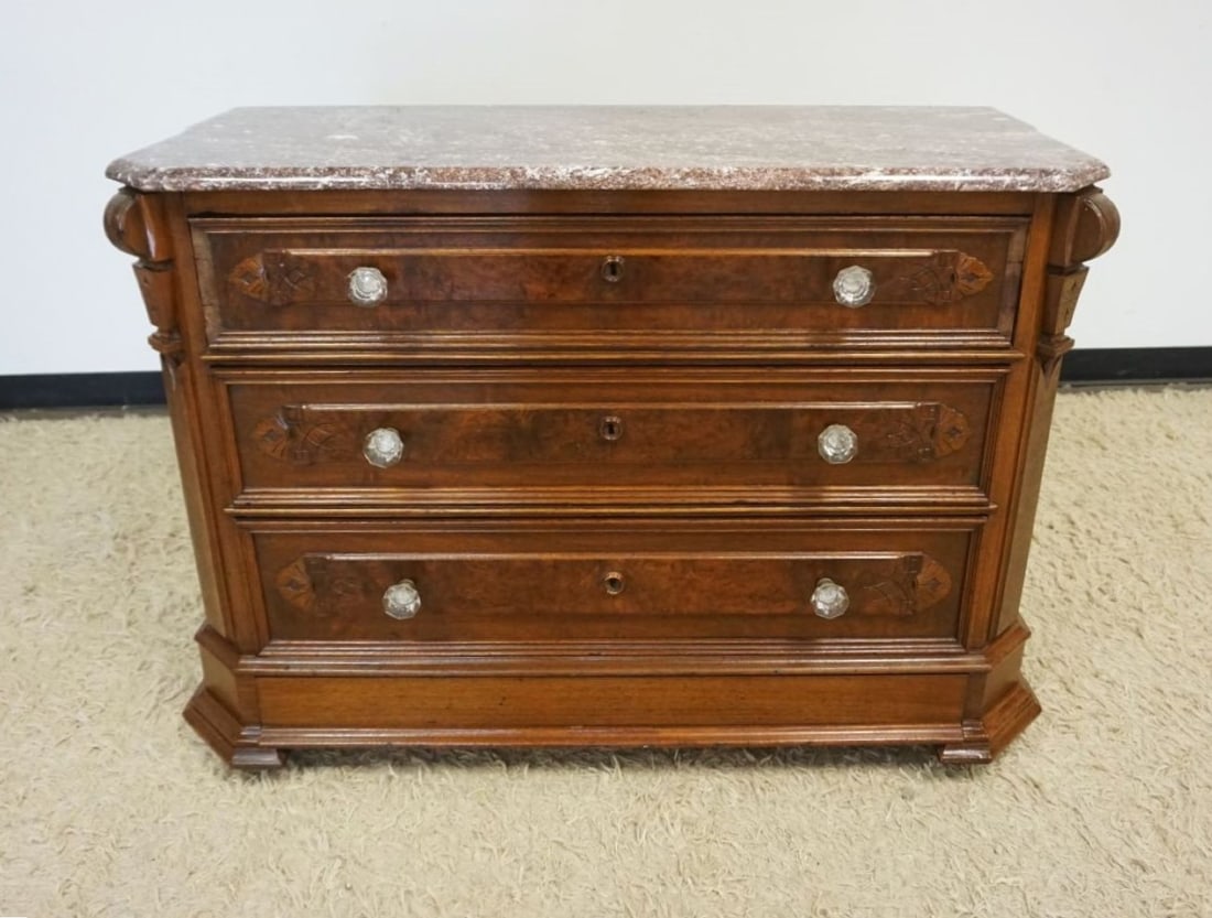 MARBLE TOP VICTORIAN CHEST: MARBLE TOP VICTORIAN 4 DRAWER CHEST WITH 1 CONCEALED AT BOTTOM, BURLWOOD DRAWER FRONTS, SOME LOSS TO DRAWER TRIM ON 1 DRAWER, APPROXIMATELY 45 1/5 IN X 20 3/4 IN X 32 3/4 IN