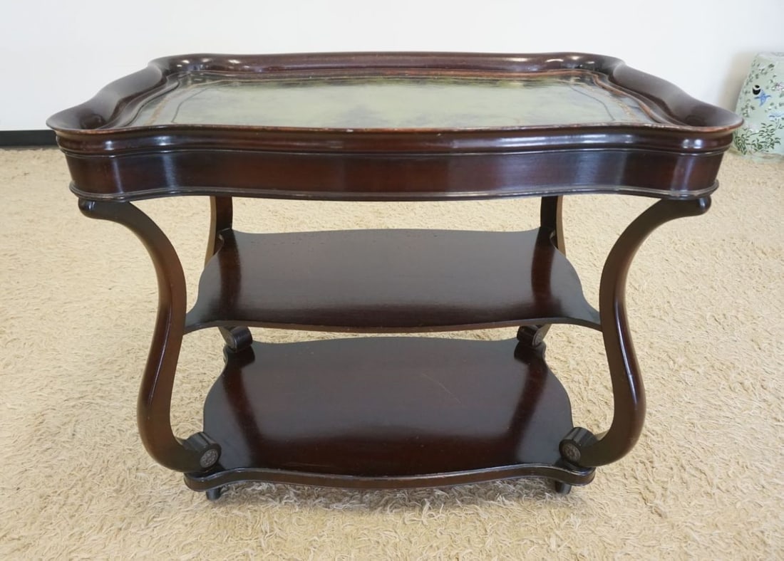 MAHOGANY SERVING CART: MAHOGANY SERVING CART WITH GREEN LEATHER TOP AND WHEELS, SOME WEAR TO LEATHER TOP, APPROXIMATELY 39 IN X 22 IN X 32 IN H