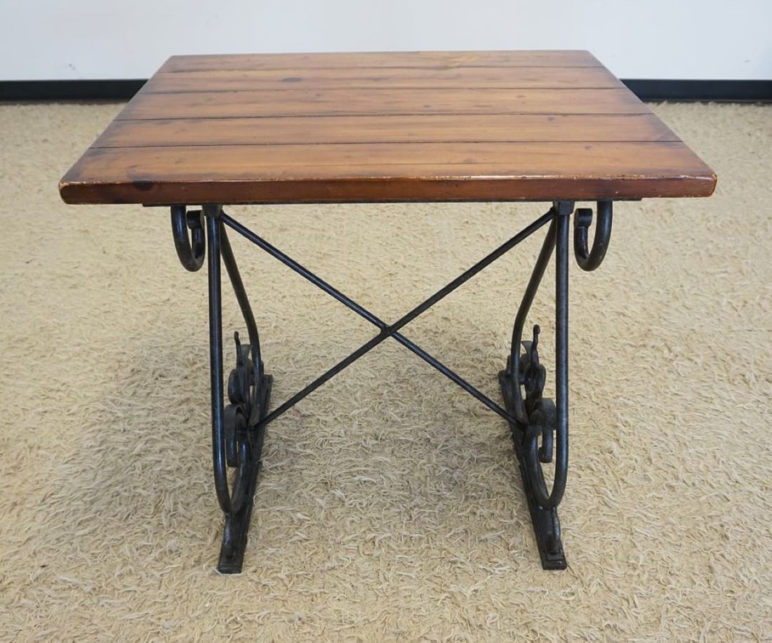 WOOD TOP STAND ON WROUGHT IRON BASE: WOOD TOP STAND ON FANCY WROUGHT IRON BASE, APPROXIMATELY 28 IN X 22 IN X 28 IN H