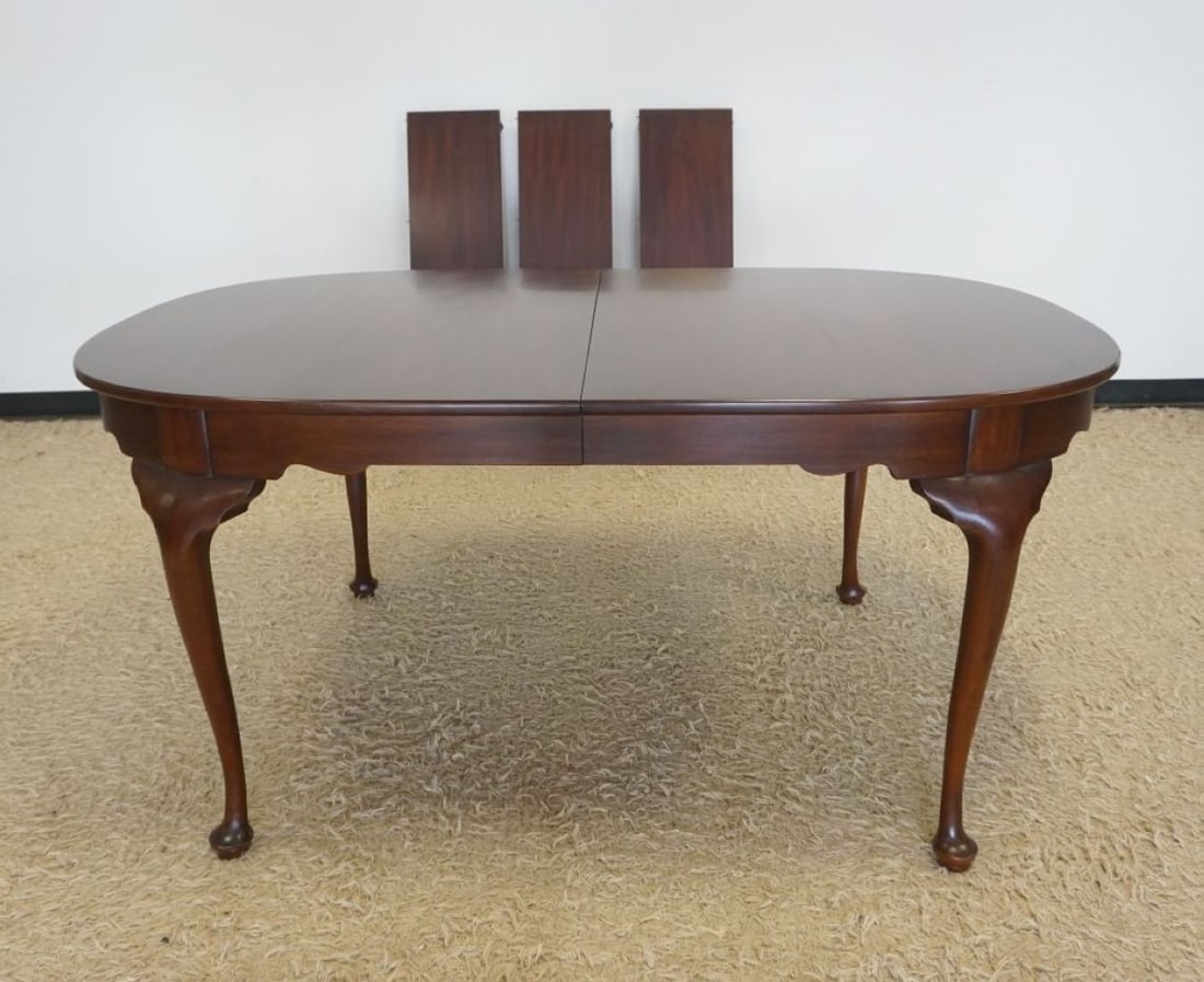 HENKEL HARRIS VIRGINIA GALLERIES OVAL DINING TABLE: HENKEL HARRIS VIRGINIA GALLERIES OVAL DINING TABLE WITH 3 LEAVES, FINISH #29, TABLE APPROXIMATELY 64 IN X 32 IN X 30 IN H, EACH LEAVE APPROXIMATELY 12 IN