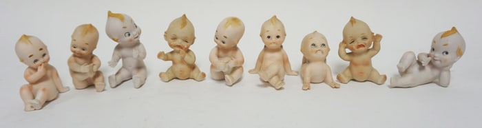 GROUP OF BISQUE KEWPIE FIGURES