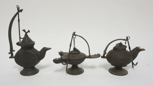 GROUP OF BRONZE OIL LAMPS